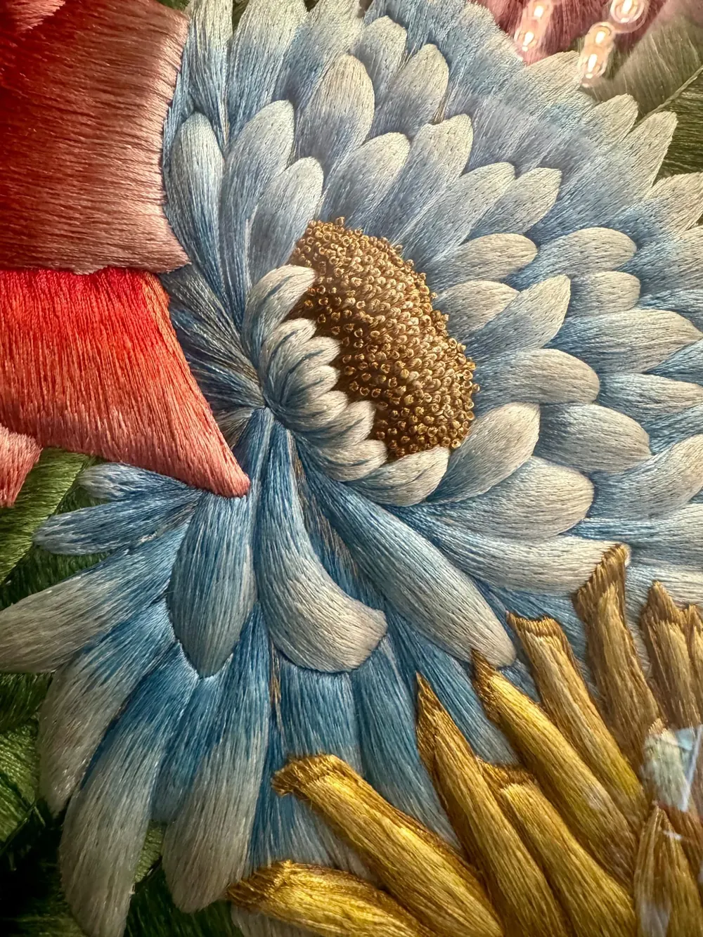 Blue chrysanthemum in raised silk